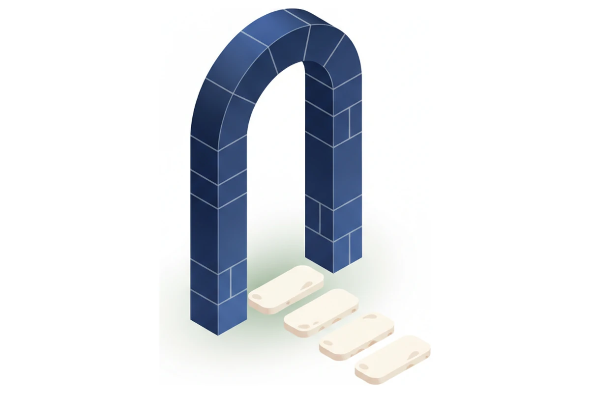 A stone archway with an open doorway, and stepping stones leading away from it.